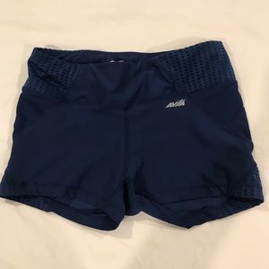 Dark blue tight athletic shorts